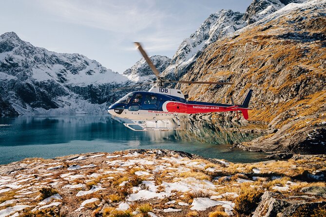 Milford Sound Heli Tour from Queenstown with 2 Alpine Landings - Hovering over Milford Sound: what a landing really adds