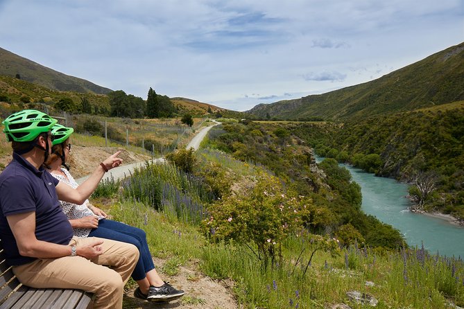 Queenstown Guided E-bike Wine Tour - Gibbston River Trail: pacing along water, vineyards, and grazing farms