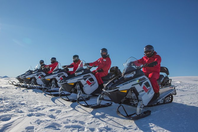 Queenstown Heli-Snowmobiling Adventure - Meeting at Lucas Place and setting up for a smooth run