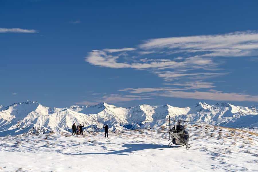 Queenstown Helicopter Flight with Snow Landing | 30 mins - Where the stops fit: Queenstown passes, sightseeing time, then snow