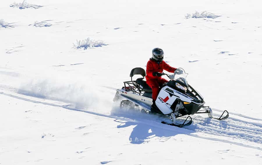 Queenstown: Snowmobiling Experience with Helicopter Flight - Hotel Pickup and Gear: Turning Cold Weather Into a Comfortable Start