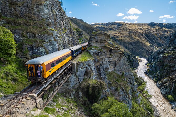 Queenstown to Dunedin with Taieri Gorge Train One-Way Tour - Boarding at Pukerangi: where the guide hands you off to the rails