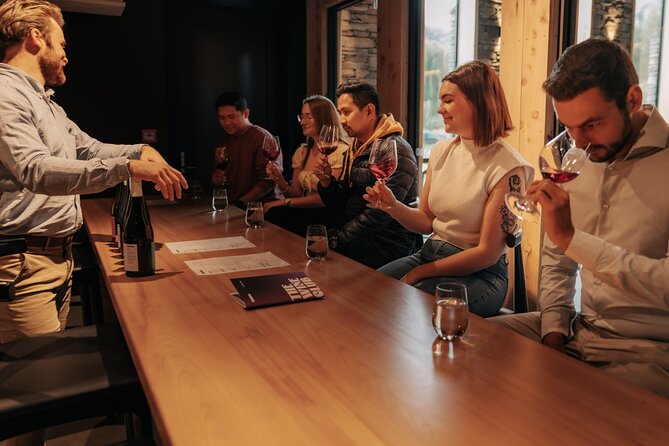 Queenstown Wine Tour - Gibbston Valley Cave | Kinross | Amisfield - Amisfield Restaurant & Cellar Door: stone architecture and Lake Hayes views