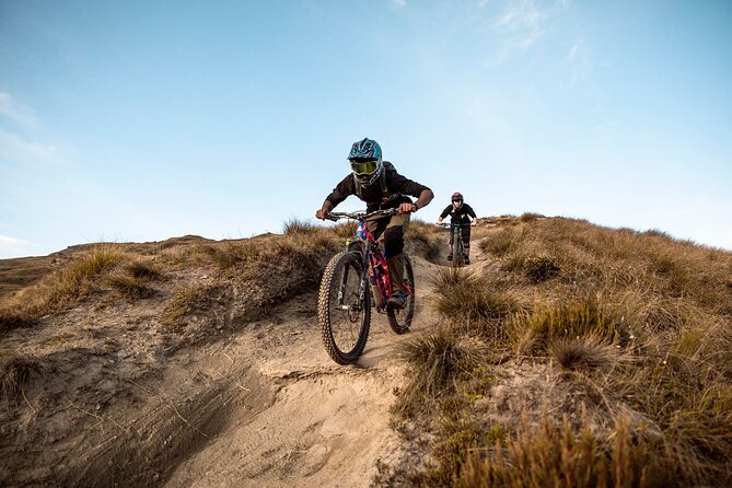 Unlock Your Potential with a Private mountain bike lesson. - Getting to the riding: Sports Queenstown, a short drive, and Lake Wakatipu